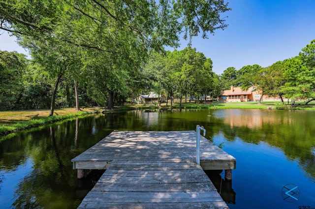 view of dock with a water view