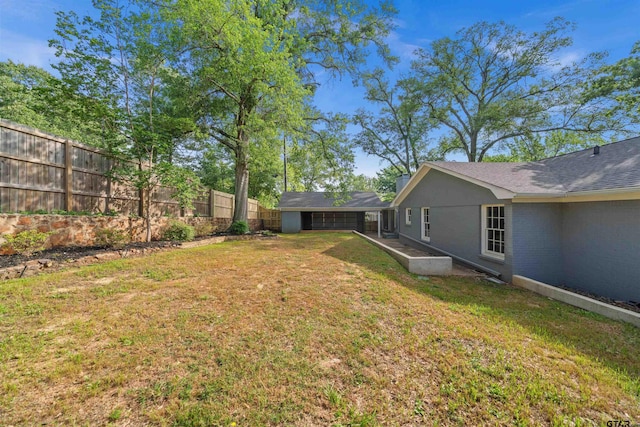 view of yard with fence