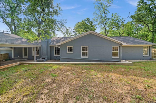 back of property featuring a patio area
