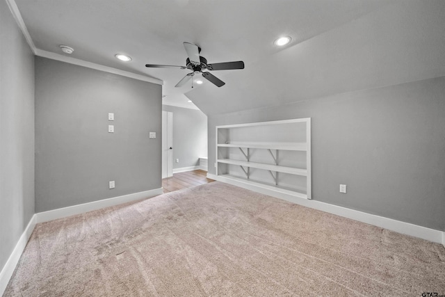 bonus room featuring carpet flooring, recessed lighting, baseboards, and built in features