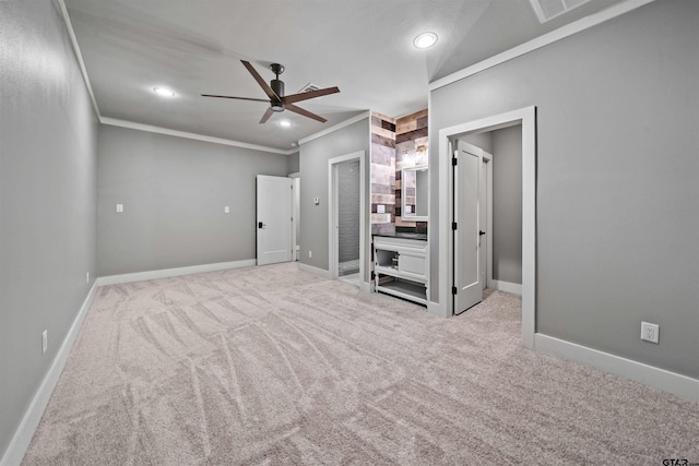 unfurnished bedroom with a ceiling fan, baseboards, recessed lighting, ornamental molding, and light carpet