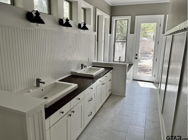 interior space featuring marble finish floor and a sink