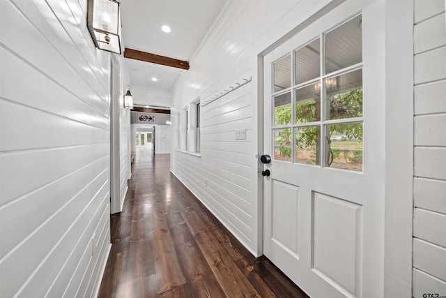 hallway with recessed lighting, beam ceiling, and dark wood-type flooring