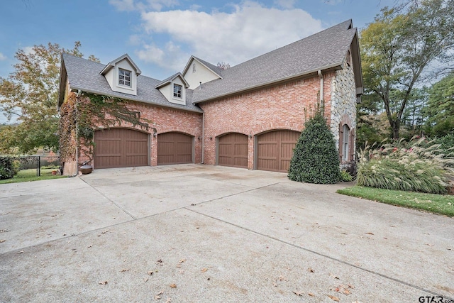 view of home's exterior featuring a garage