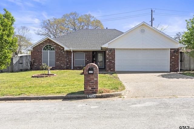 single story home featuring driveway, a front yard, fence, brick siding, and a garage