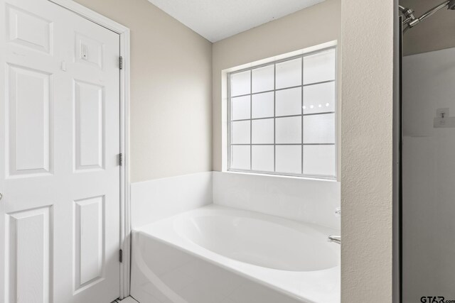 full bath with a bath