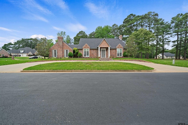 view of front of home with a front yard