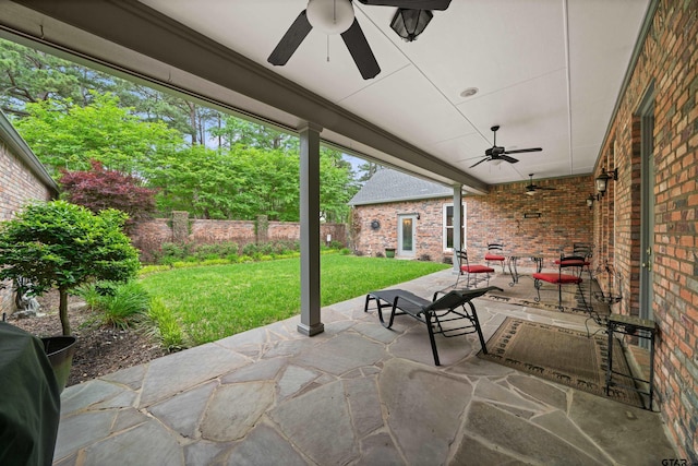 view of patio / terrace featuring ceiling fan