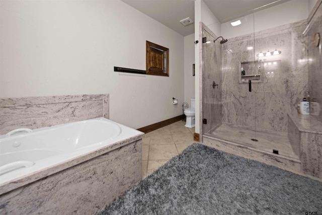 bathroom with tile patterned floors, separate shower and tub, and toilet