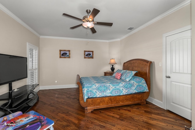 bedroom with dark wood-type flooring, ceiling fan, and crown molding