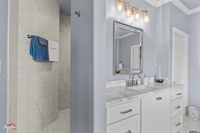 bathroom featuring crown molding and vanity