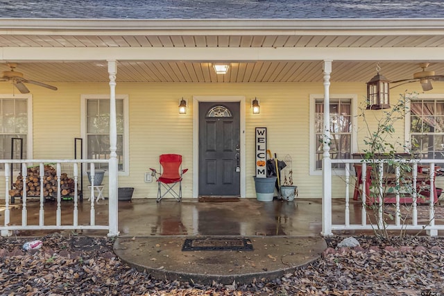 doorway to property featuring ceiling fan