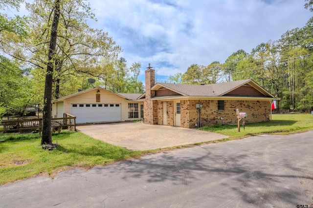 102 King Henry Rd, Scroggins, TX 75480 - ranch-style home featuring driveway, a chimney, a front lawn, and an attached garage