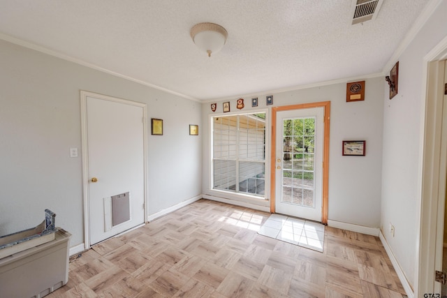 102 King Henry Rd, Scroggins, TX 75480 - unfurnished room with baseboards, visible vents, crown molding, and a textured ceiling