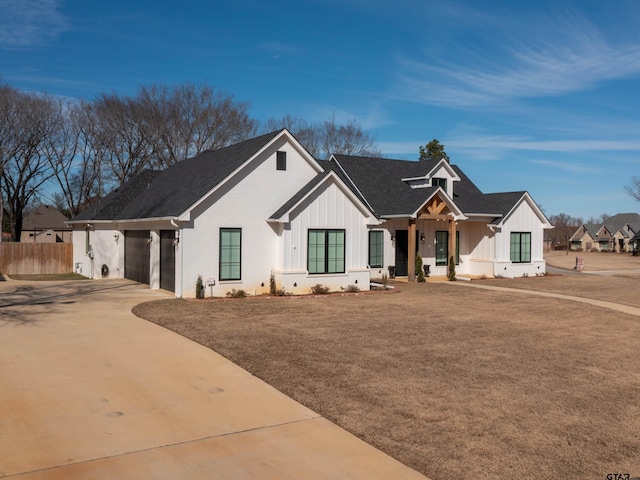 modern farmhouse with a garage