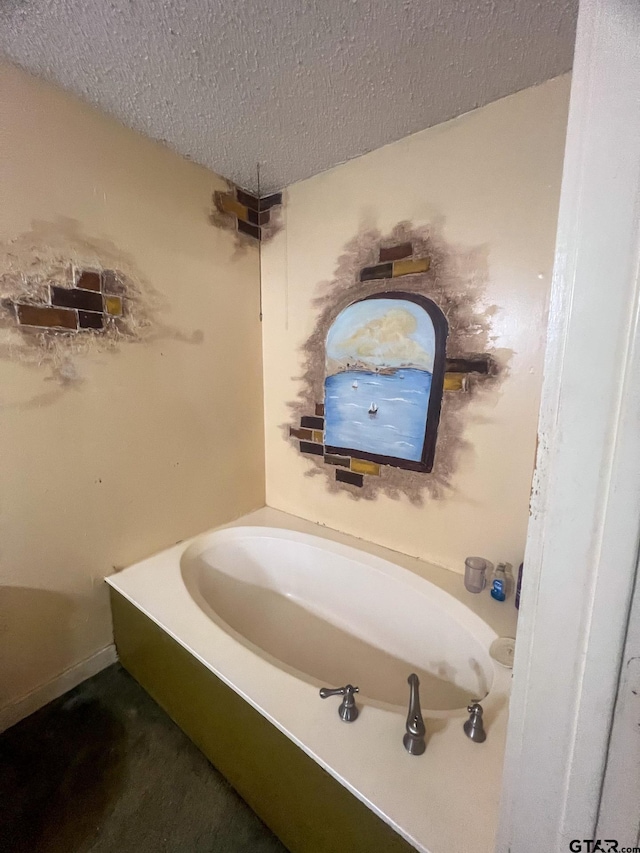 625 S Buffalo St, Canton, TX 75103 - bathroom with a textured ceiling and a bath