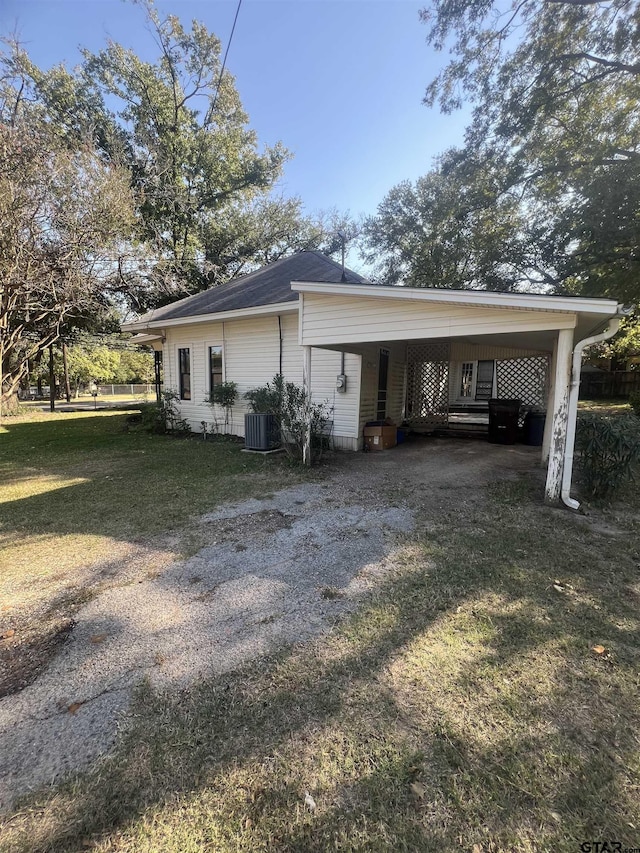 625 S Buffalo St, Canton, TX 75103 - view of home's exterior with driveway, a carport, and a yard