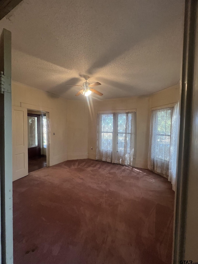 625 S Buffalo St, Canton, TX 75103 - carpeted empty room featuring a textured ceiling and a ceiling fan