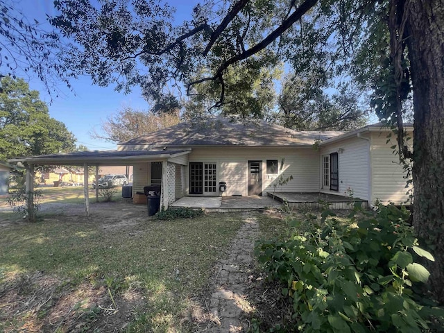 625 S Buffalo St, Canton, TX 75103 - back of property featuring a carport and a patio area