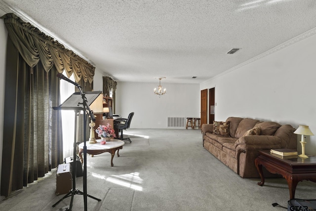 living room with light colored carpet, a textured ceiling, and an inviting chandelier