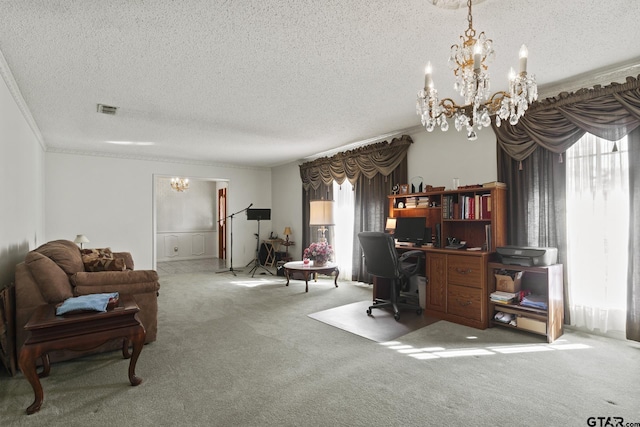 office area with carpet, plenty of natural light, a textured ceiling, and a notable chandelier