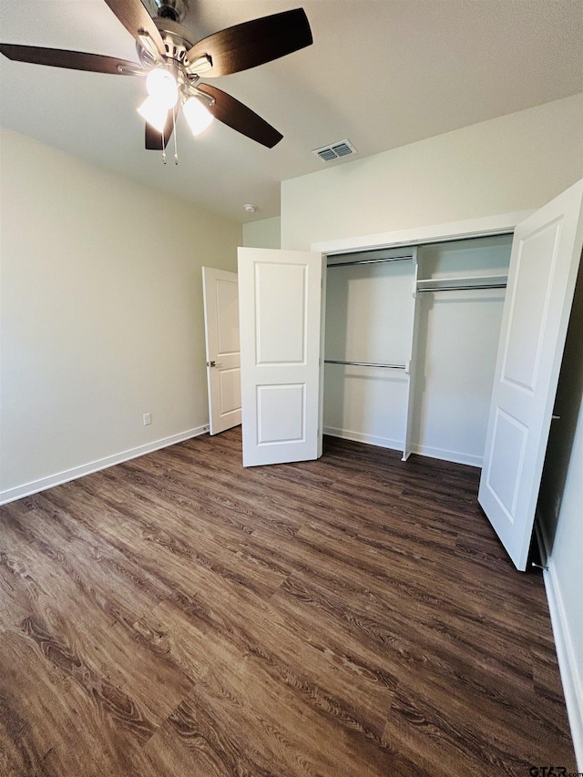 15033 High Country Acres Ln, Tyler, TX 75706 - unfurnished bedroom featuring dark wood-style floors, a closet, and ceiling fan
