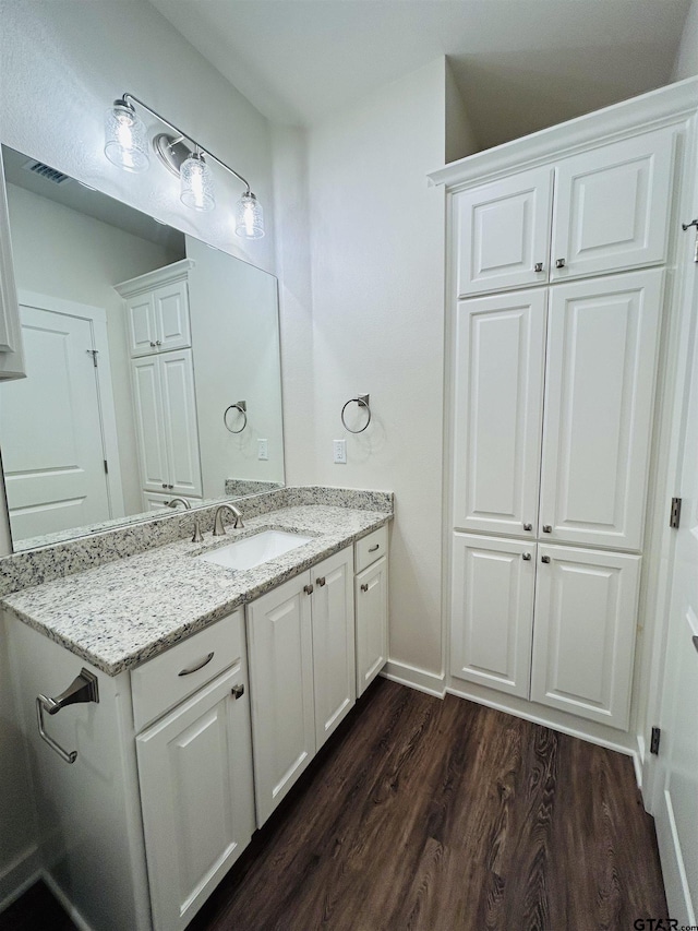 15033 High Country Acres Ln, Tyler, TX 75706 - bathroom with wood finished floors and vanity