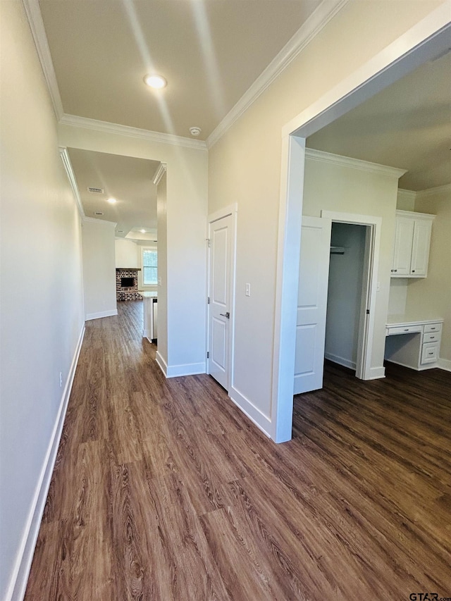 15033 High Country Acres Ln, Tyler, TX 75706 - corridor with dark wood finished floors, crown molding, and recessed lighting
