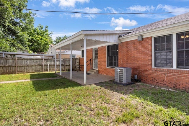 1931 S Wiley, Tyler, TX 75701 - rear view of house with brick siding, entry steps, and a patio
