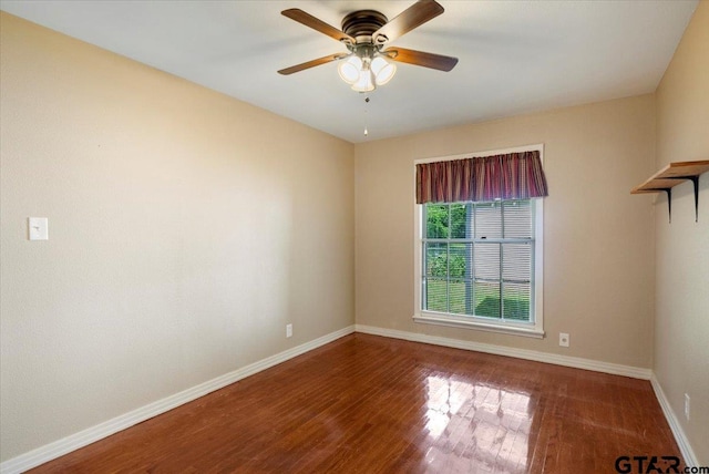 1931 S Wiley, Tyler, TX 75701 - unfurnished room featuring a ceiling fan and wood finished floors