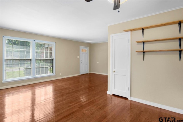1931 S Wiley, Tyler, TX 75701 - unfurnished room with wood finished floors and ceiling fan