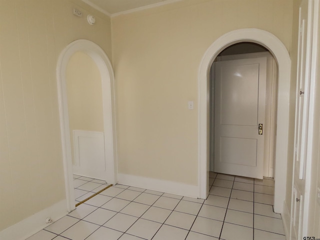 corridor with light tile patterned flooring