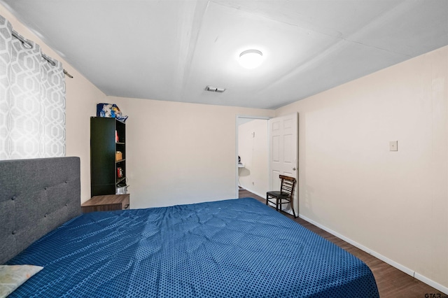 bedroom featuring hardwood / wood-style flooring