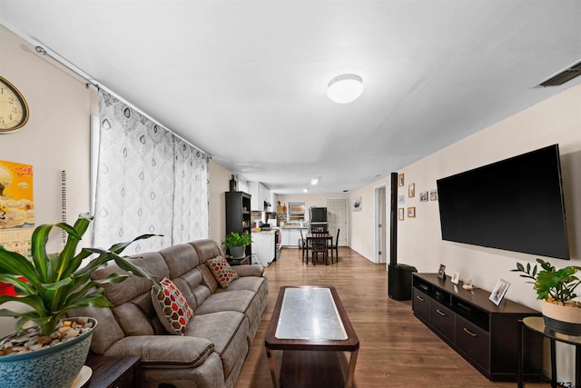 living room with hardwood / wood-style flooring