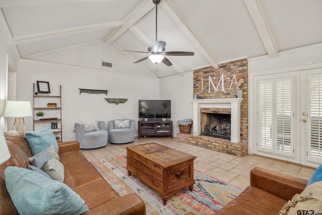 312 Savannah Dr, Tyler, TX 75703 - living room featuring ceiling fan, tile patterned flooring, beam ceiling, a brick fireplace, and high vaulted ceiling