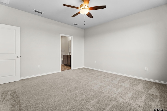 unfurnished room featuring carpet flooring and ceiling fan