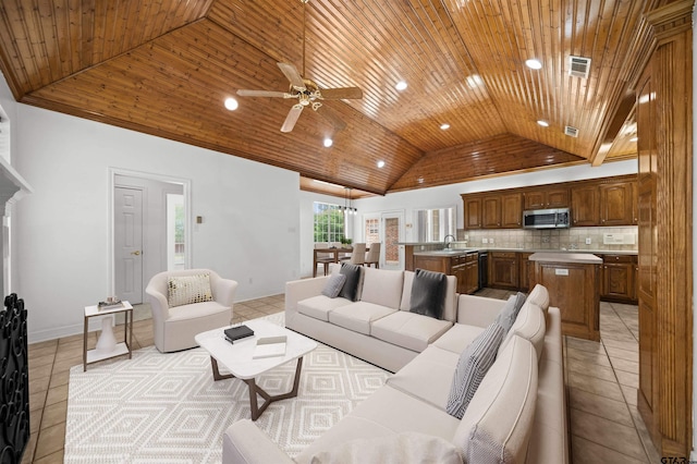 2107 Baylor Dr, Jacksonville, TX 75766 - living area featuring wood ceiling, light tile patterned floors, ceiling fan, recessed lighting, and baseboards