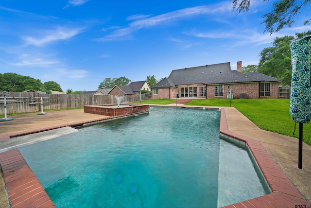 2107 Baylor Dr, Jacksonville, TX 75766 - view of swimming pool with a patio, a pool with connected hot tub, and central AC unit