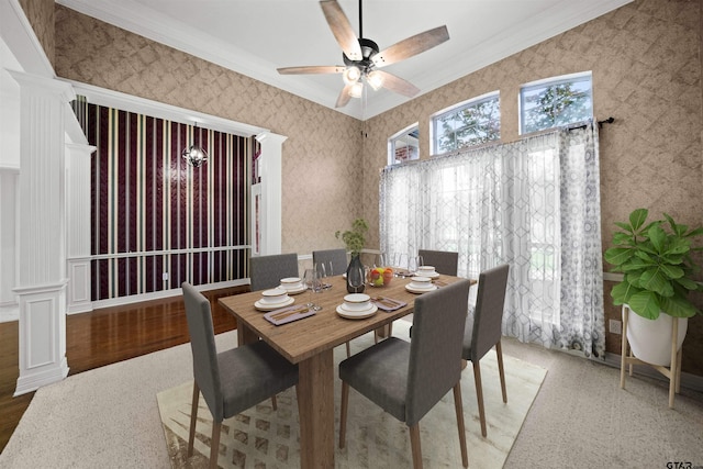 2107 Baylor Dr, Jacksonville, TX 75766 - dining area with crown molding, ornate columns, and a ceiling fan