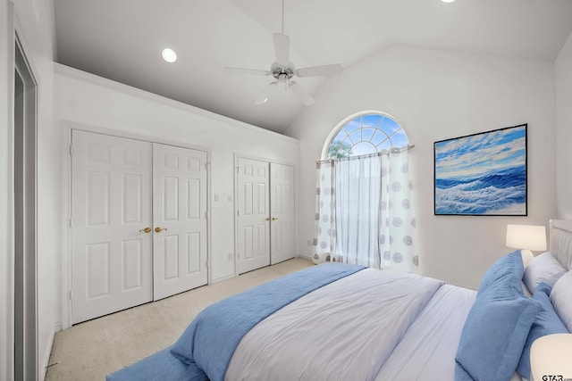 2107 Baylor Dr, Jacksonville, TX 75766 - carpeted bedroom featuring multiple closets, lofted ceiling, ceiling fan, and recessed lighting