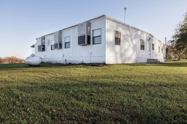 765 Rs County Road 3410, Emory, TX 75440 - view of side of home featuring a lawn and cooling unit