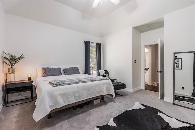 bedroom featuring ceiling fan, carpet flooring, and lofted ceiling