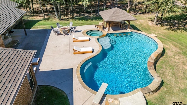 view of swimming pool featuring a yard, a patio, a gazebo, and an in ground hot tub