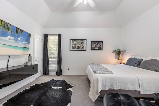 bedroom featuring ceiling fan, lofted ceiling, and light colored carpet