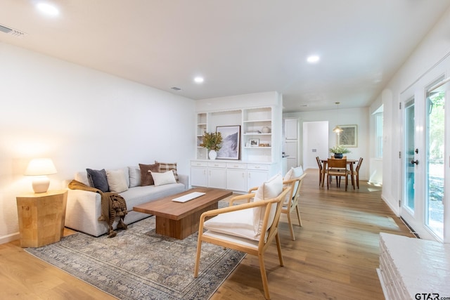 living room featuring light wood-type flooring