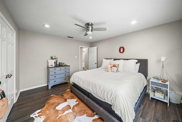 bedroom with recessed lighting, visible vents, baseboards, and wood finished floors