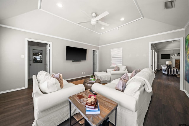 living room featuring visible vents, crown molding, ceiling fan, dark wood finished floors, and vaulted ceiling