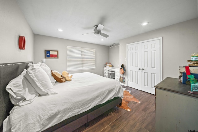 bedroom with recessed lighting, a ceiling fan, dark wood-style flooring, and a closet