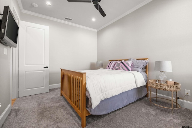 bedroom with crown molding, carpet floors, and ceiling fan