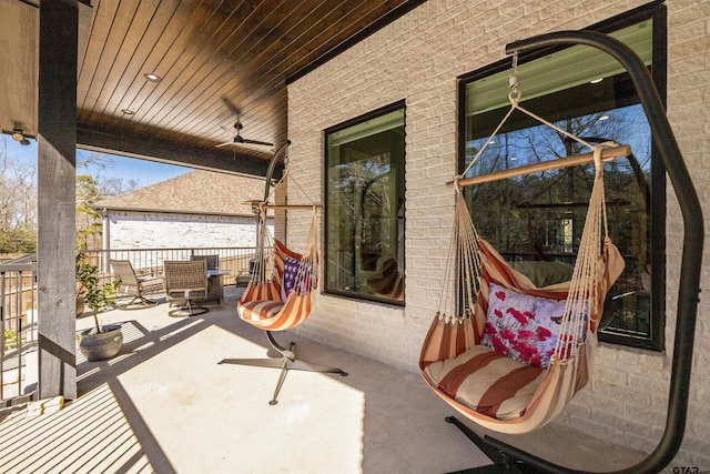 view of patio featuring ceiling fan